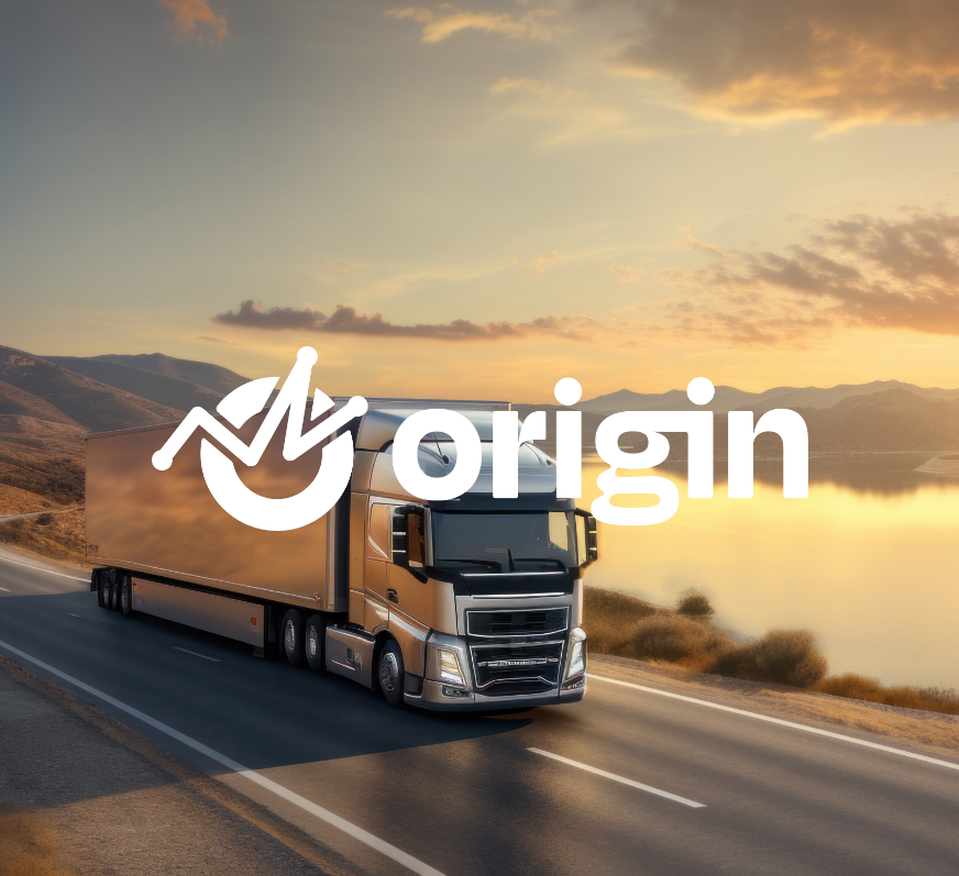 Origin branded truck on the road at sunset